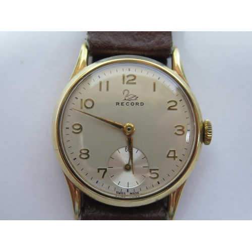 107 - A Record 9ct Gold Gent's Manual Wristwatch, the 32mm dial with subsidiary seconds dial, the 15 jewel... 