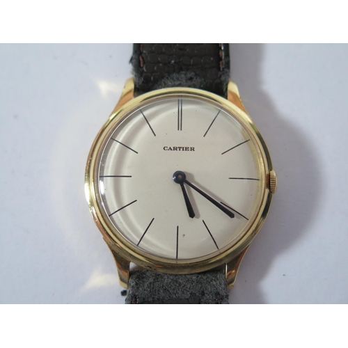 168 - A Jaeger LeCoultre 18ct Gold Gent's Wristwatch with Cartier 34mm dial, movement no. 1203369, 1960's,... 