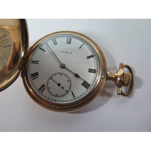 3 - An Elgin Gold Plated Keyless Full Hunter Pocket Watch, the enamelled dial with Roman numerals and  h... 