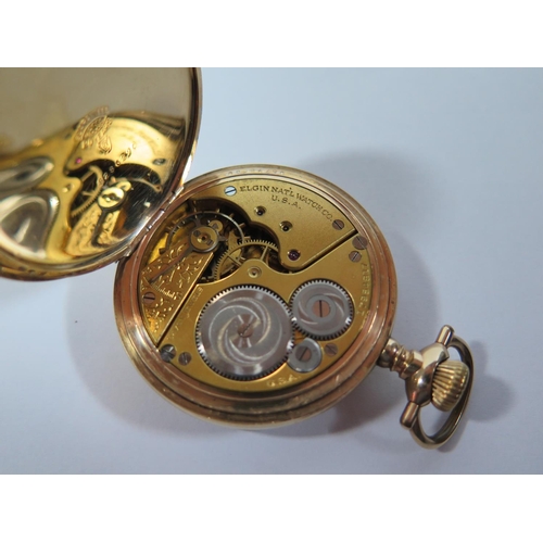 3 - An Elgin Gold Plated Keyless Full Hunter Pocket Watch, the enamelled dial with Roman numerals and  h... 