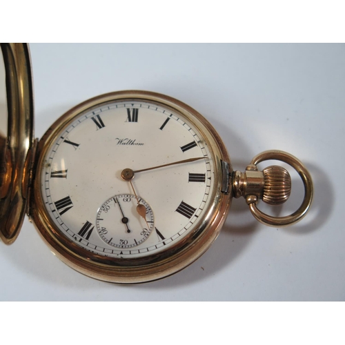 63 - A Waltham Traveller Gold Plated Full Hunter Pocket Watch in Moon case, the 50mm enamelled dial with ... 