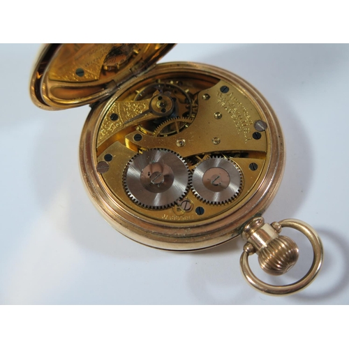 63 - A Waltham Traveller Gold Plated Full Hunter Pocket Watch in Moon case, the 50mm enamelled dial with ... 