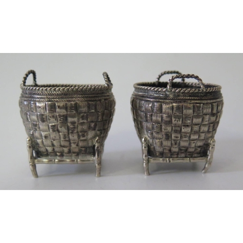 455 - A Pair of .90 Chinese Silver Salts in the form of woven sacks, maker HW, 4.5cm high