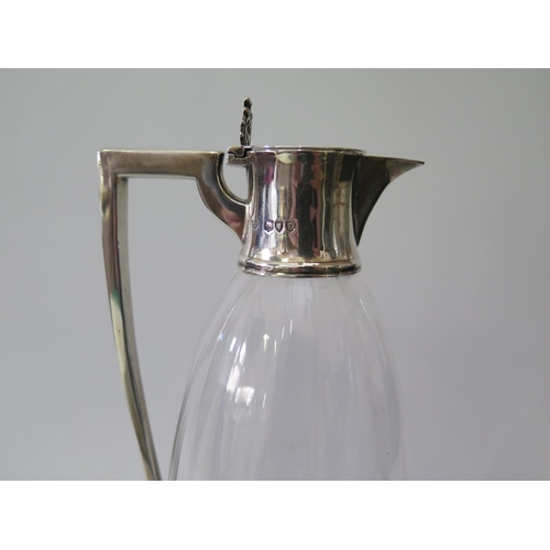 463 - A Victorian Silver Mounted Claret Jug, London 1895, W. Hutton & Sons, 24.5cm high