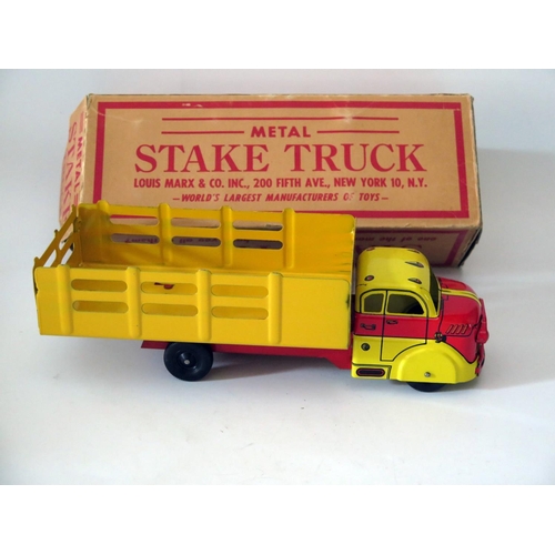 504 - Tin Plate Toy _ A Marx Dodge Stake Truck, 31cm. Manufactured in 1955 and complete with original box