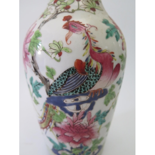 513 - A Nineteenth Century Chinese Famille Rose Porcelain Vase decorated with Fenghuang, 23cm