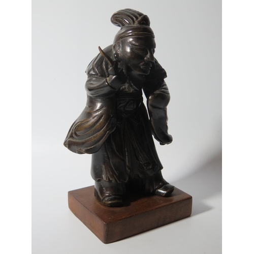 530 - An Oriental Bronze Figure on oak stand, 22cm