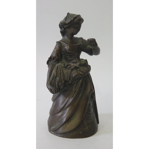 560 - A Bronze Bell modelled as a lady with wheat sheaf, 19cm