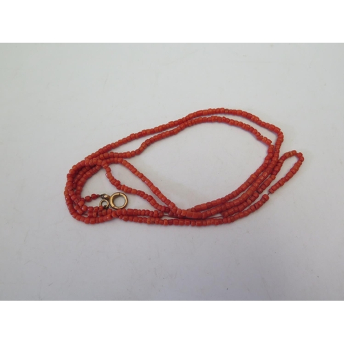 128 - A Long Coral Bead Necklace, 23.2g