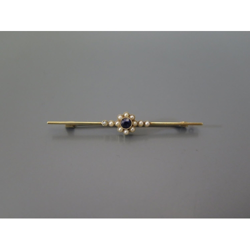 202 - A 15ct Gold, Sapphire and Seed Peal Bar Brooch, 3.9g