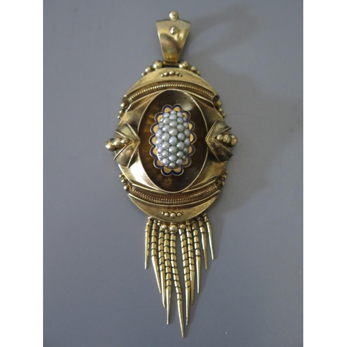 203 - A Victorian Gold Pendant with blue enamel and pearl decoration and photograph of gentleman to the ba... 