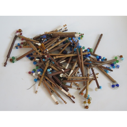 254 - A Large Collection of Nineteenth Century Turned Wooden Lace Maker's Bobbins with glass spangles