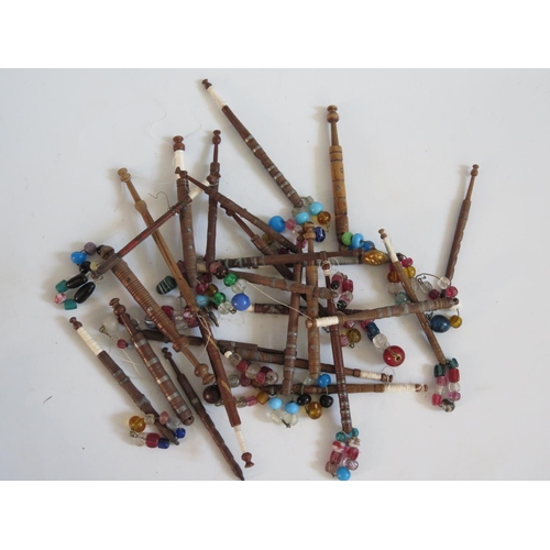 255 - A Large Collection of Nineteenth Century Turned Wooden Lace Maker's Bobbins with pewter inlay and gl... 