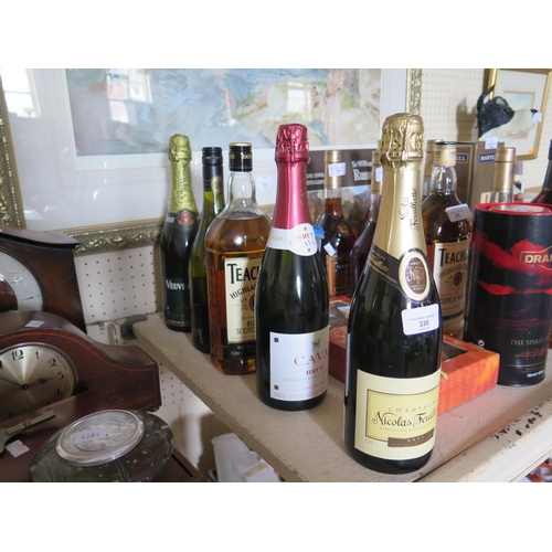 335 - A Bottle of Nicolas Feuillatte Champagne, bottle of Cava and three others