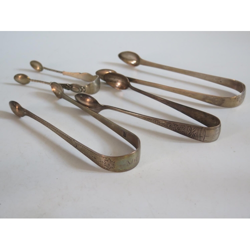 41 - A Pair Georgian Silver Sugar Tongs with bright cut decoration and three other pairs, 100g