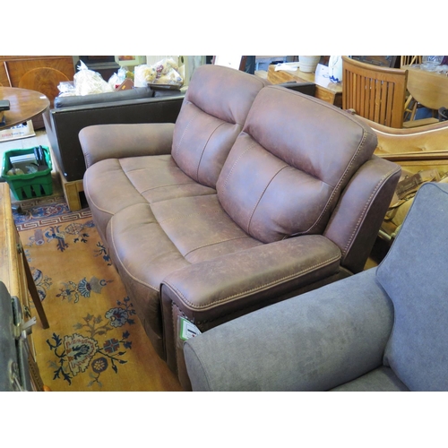 559 - A Brand New Two Seater Leatherette Sofa