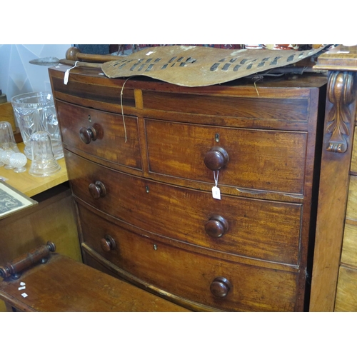 610 - A Georgian Mahogany and Strung Bow Fronted Chest of Drawers