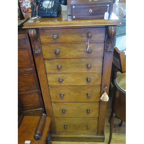 615 - A Victorian Walnut Wellington Chest, with key in office