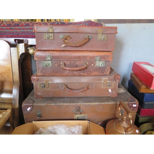 815 - Canvas Trunk and three leather suitcases