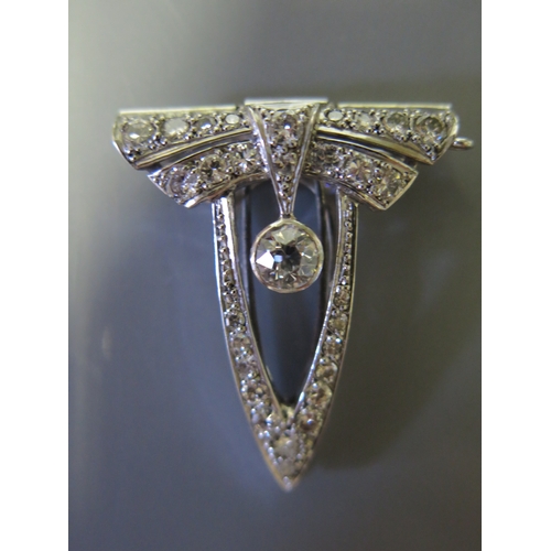 136A - An Art Deco Platinum Set Diamond Clip, 6.9g, central diamond c. .6ct