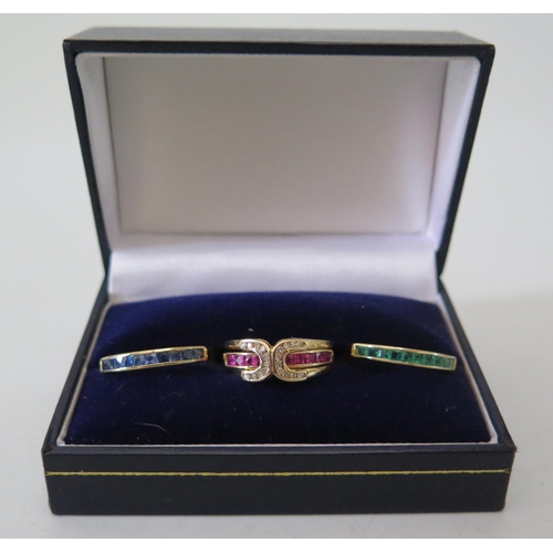 157 - A Cased Set of .585 Yellow Gold, Emerald, Ruby and Sapphire Interchangeable Rings with diamond Setti... 