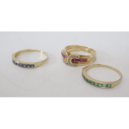 157 - A Cased Set of .585 Yellow Gold, Emerald, Ruby and Sapphire Interchangeable Rings with diamond Setti... 