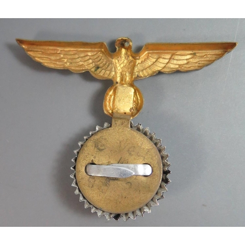 260 - A German WWII Kriegsmarine Cap Eagle (top pin missing)