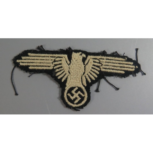 264 - A German WWII SS Sleeve Eagle in  cloth