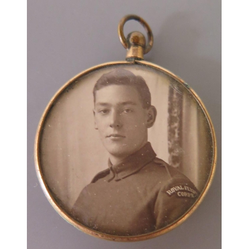 281 - A Double Sided Photograph Pendant showing portraits of Royal Flying Corps Soldier (pre-1 April 1918)