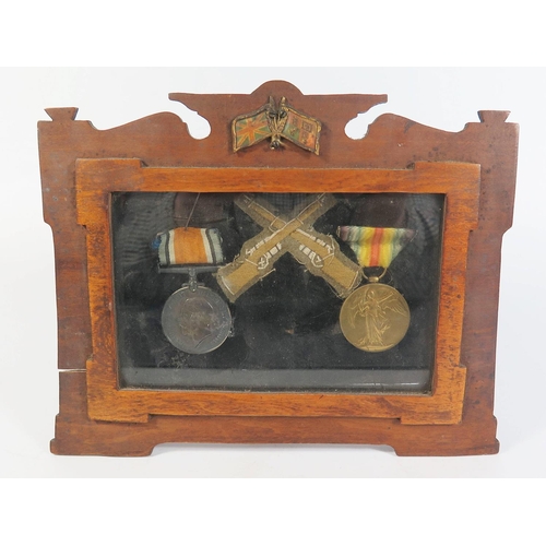 286a - A WWI Medal Pair in display case, awarded to 266429 CPL. A. STEER. DEVON R.