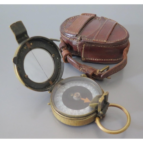 286B - A WWI British Marching Compass dated 1918 and in original leather case