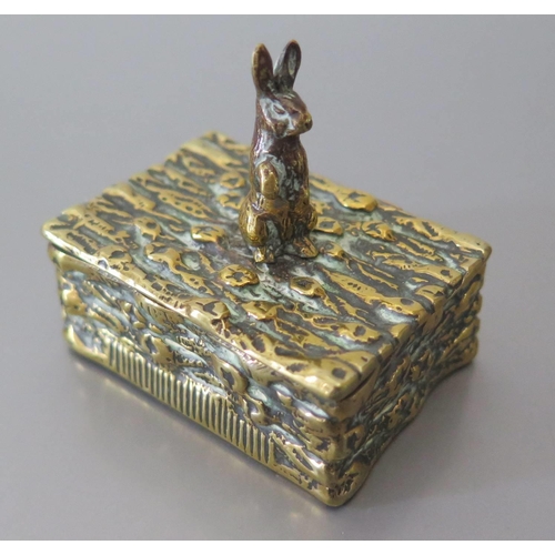 291 - A Brass Vesta with hinged top and rabbit finial, 19th century, 5 x 3.5cm base