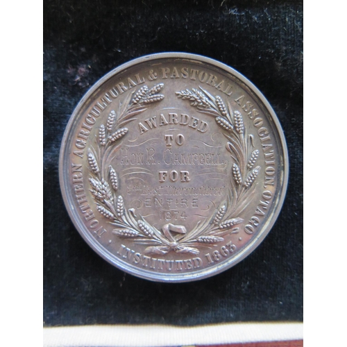 294 - A Northern Agricultural & Pastoral Association Silver Medallion awarded to Hon R Campbell for 2nd Be... 