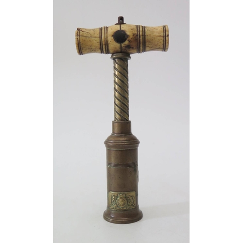 302b - An Early Nineteenth century Brass Corkscrew with bone handle and Royal warrant