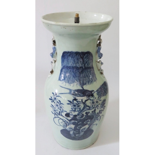 368 - A Nineteenth Century Chinese Celadon Porcelain Baluster Vase with blue and white bird and foliate de... 