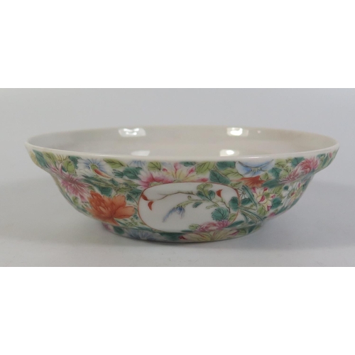 379 - A Nineteenth Century Chinese Porcelain Bowl with floral decoration, six character mark to base, 15.5... 