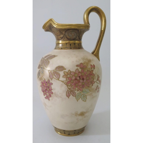 387 - A Doulton Burslem Ewer with floral and gilt decoration, 16cm to handle