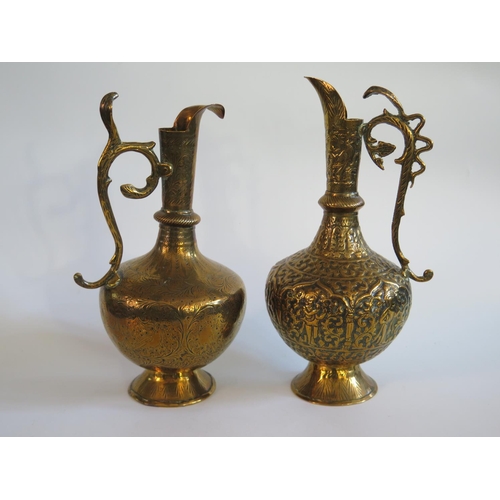 544 - Two Indian Brass Ewers