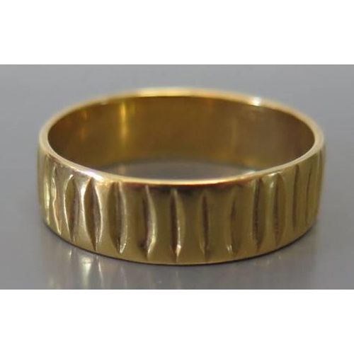 104 - A 22 carat gold wedding band, size P.5, 4.7g