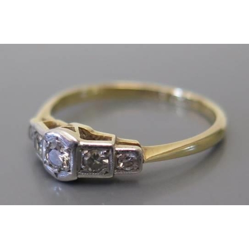 109 - An 18 karat gold and platinum diamond five stone ring, size L, 2g