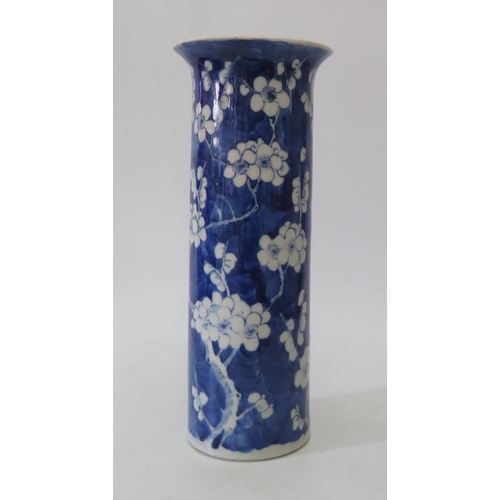 358 - A Chinese 19th century blue and white prunus decorated sleeve vase, 28 cm