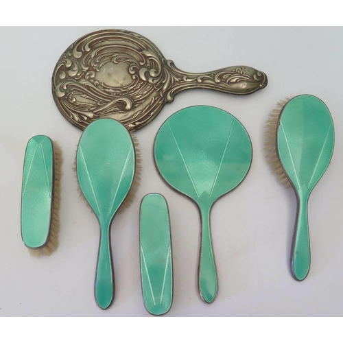 44 - A George V silver and green Guilloche enamel backed 5 part mirror and brush set and one other