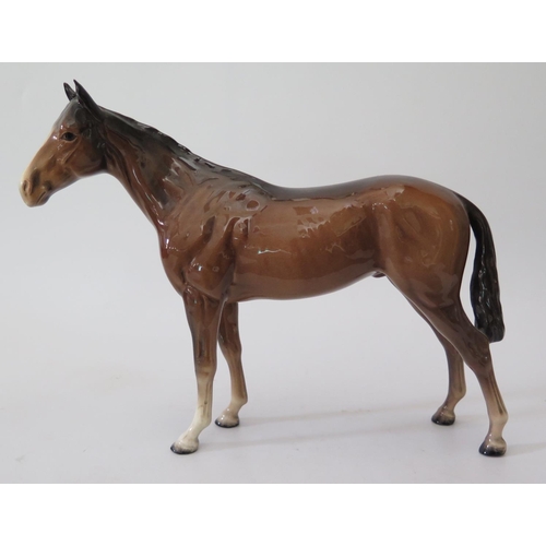 446 - A Beswick horse and silver plated cruet