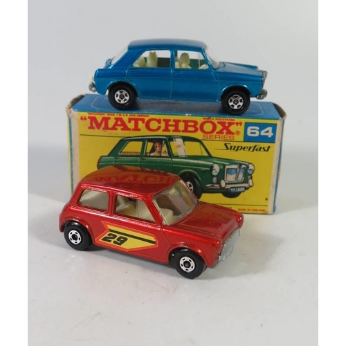 483 - A Matchbox 64 MG 1100, in metallic blue boxed and one other