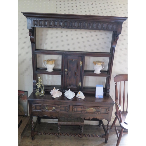 515 - Small carved oak dresser and footstool