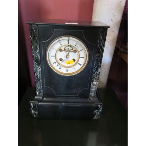 572 - L. Marti et Cie - a 19th century French marble and slate mantel clock