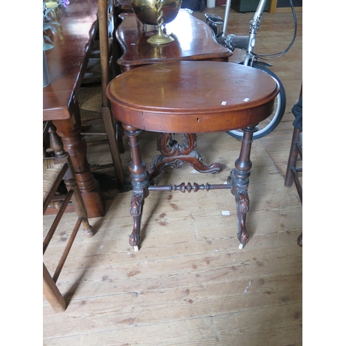 599 - A small Victorian oval mahogany occasional table with single freeze drawer