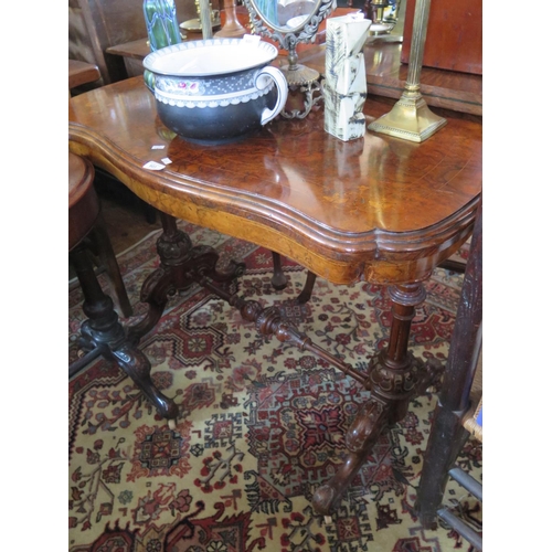 603 - A Victorian Burr walnut and marquetry inlaid centre table