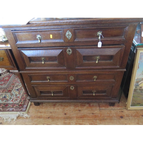 612 - An 18th century oak chest of drawers