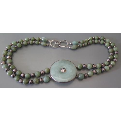 64 - A jadeite bead necklace, carnelain bead necklace and lapis lazuli